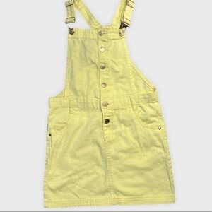 Overall skirt. Button up with pockets. Yellow. NWOT. 10